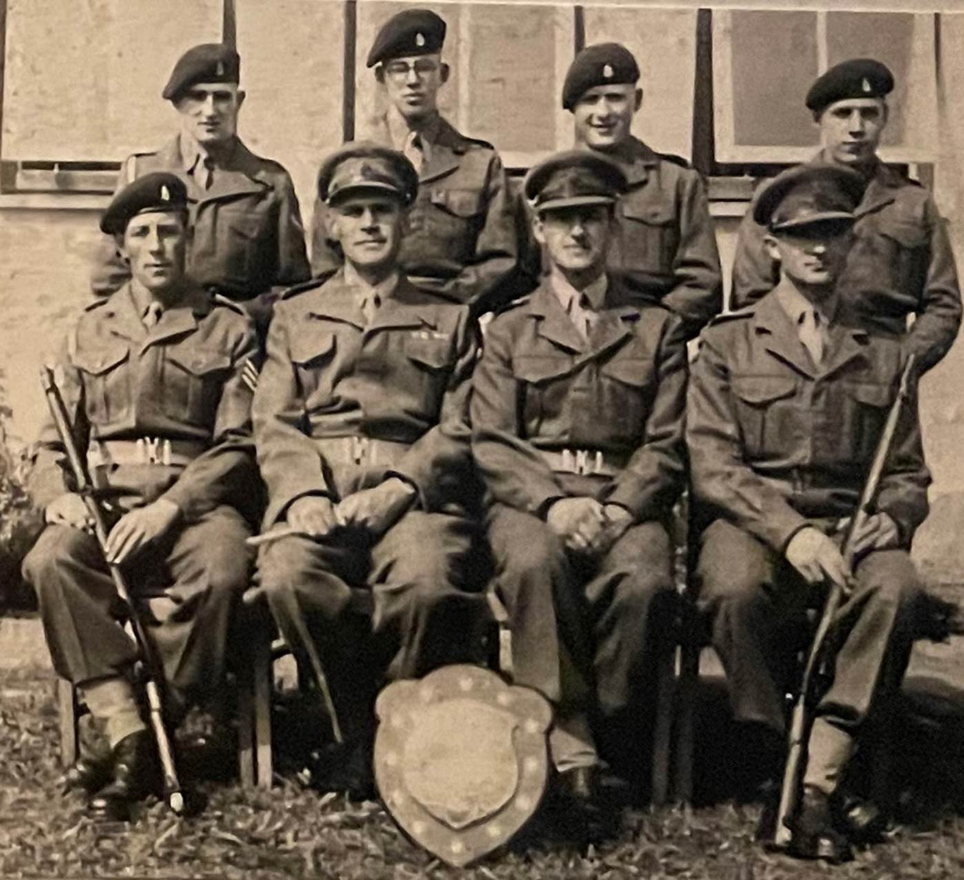 A picture containing person, military uniform, outdoor, group
Description automatically generated